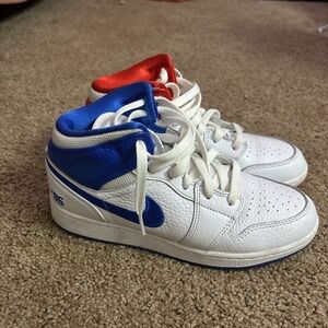 Kids White,Blue, and Red Air Jordan Sneakers